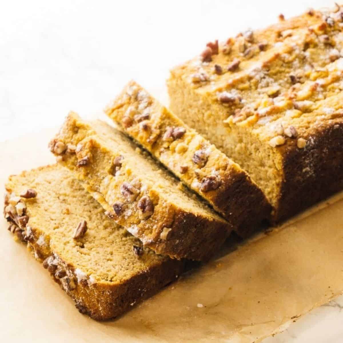 Sliced into pumpkin bread with nuts