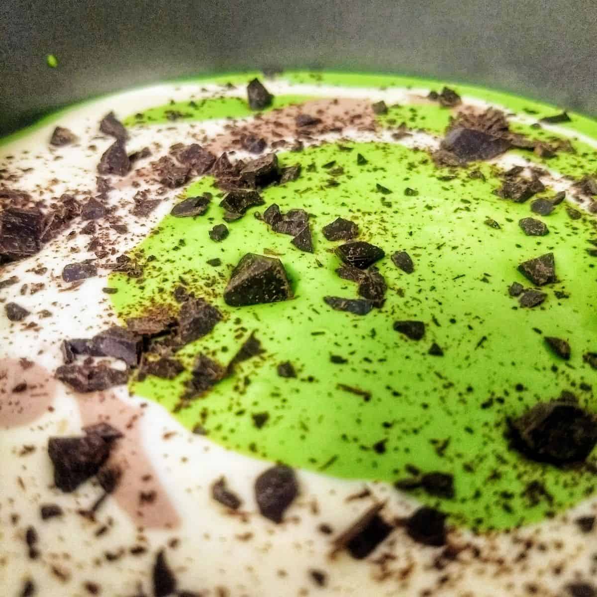 Keto mint chocolate cheesecake batter with chocolate chunks - Keto Mint Chocolate Cheesecake