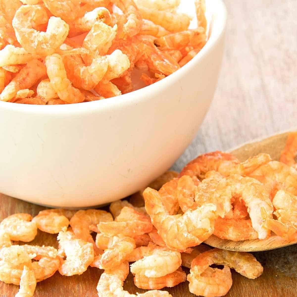 dried shrimp in a bowl and on a spoon