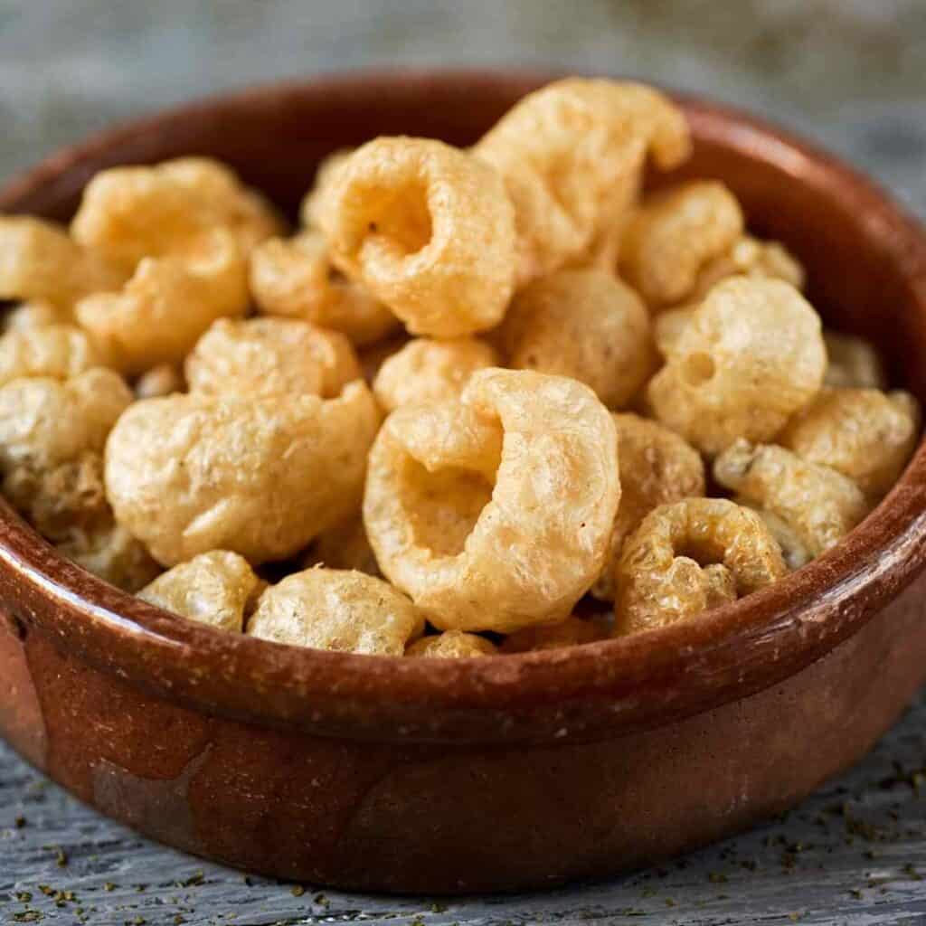 pork rinds in a bowl 1024x1024 - 22 Things You Can Dip In Guacamole On The Keto Diet