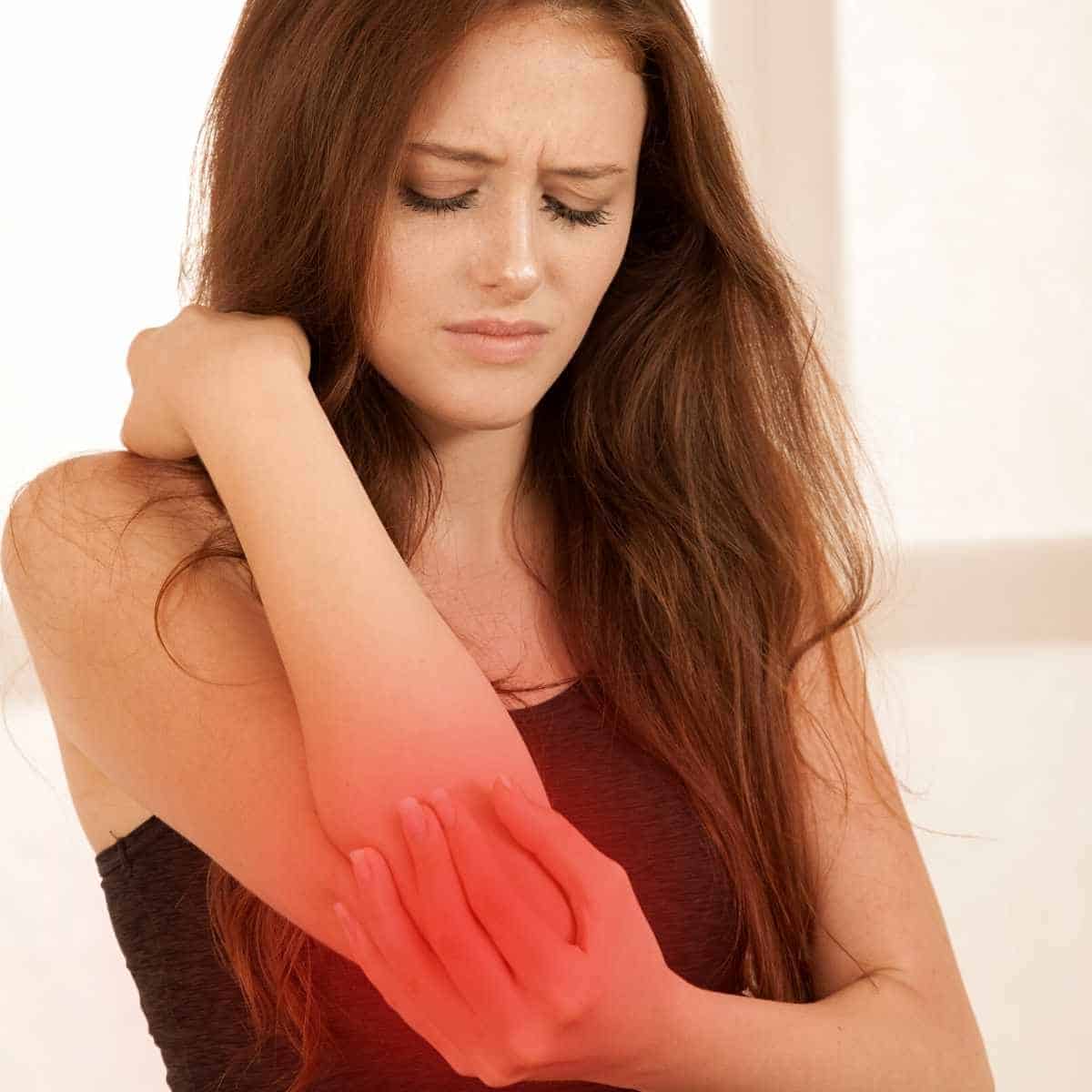 How to Fix Whole Body Aches on Keto: Advice from a Nutritionist sore joint on a lady - How to Fix Whole Body Aches on Keto: Advice from a Nutritionist