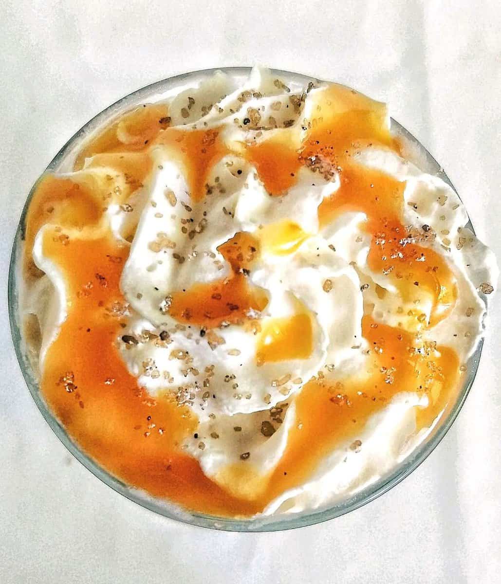 whipped cream with caramel sauce and smoked salt.