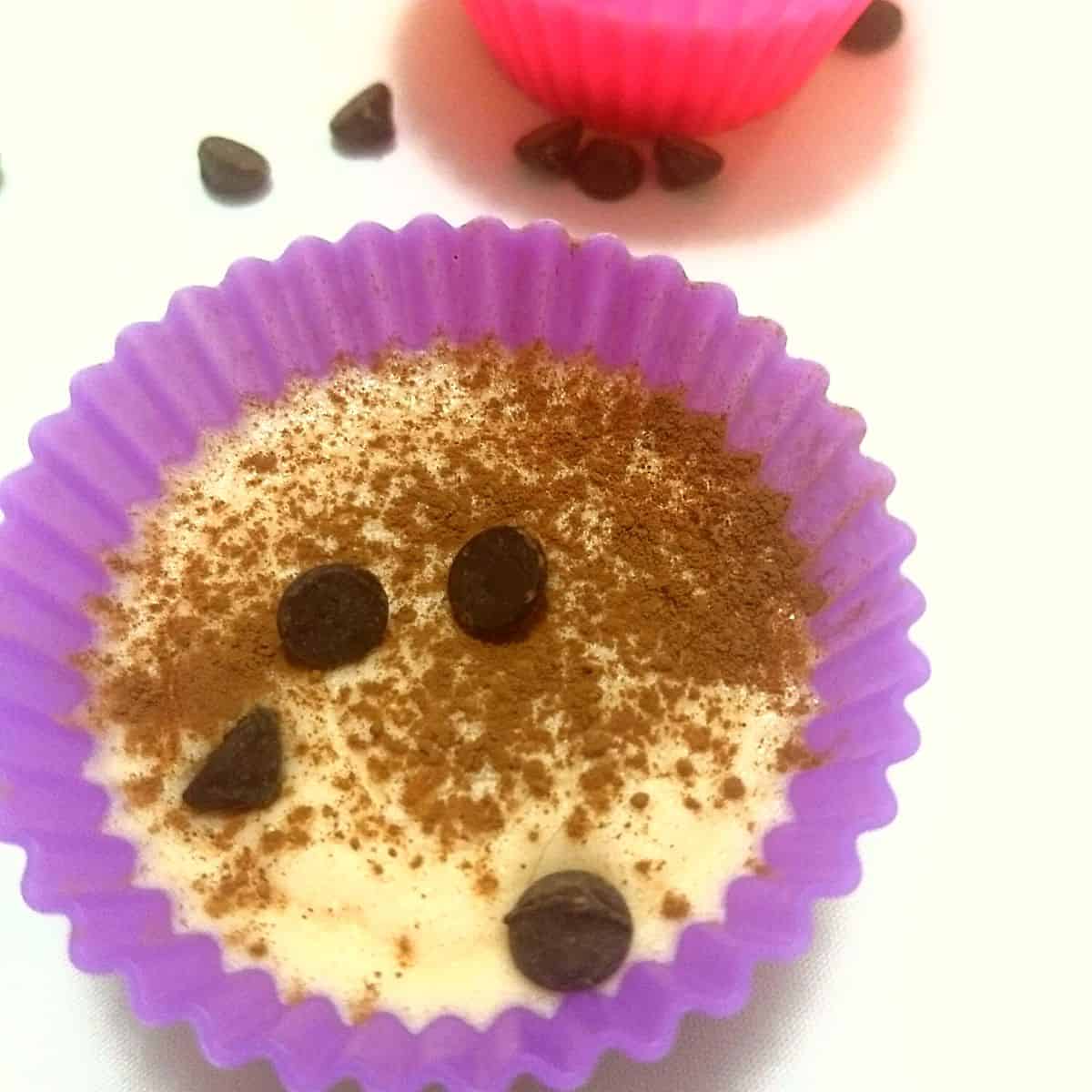 mousse in cupcake liners with chocolate chips on top